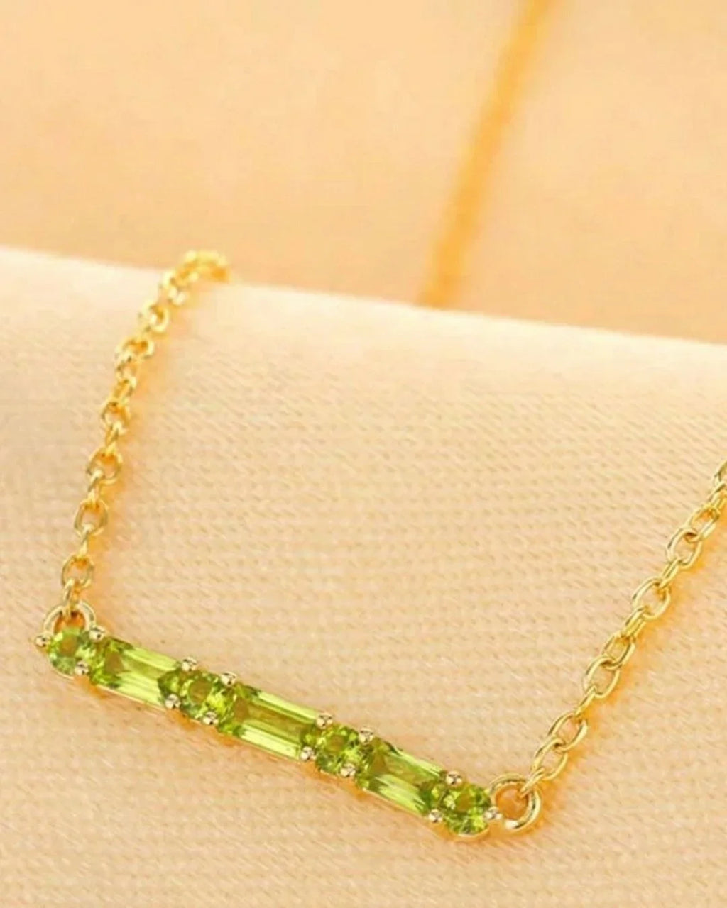 Peridot jewellery set in 18K gold by Mayuri, bespoke creation for the August birthstone