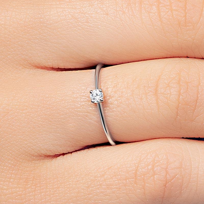 Saral delicate solitaire diamond engagement ring in 18k white gold