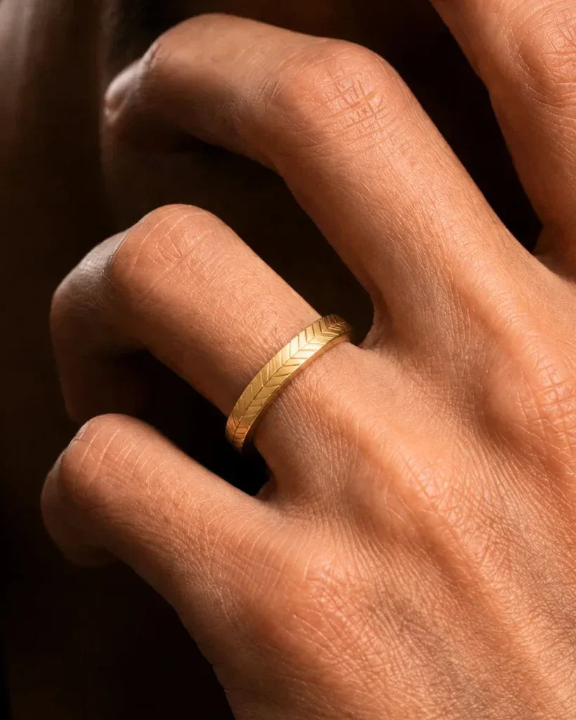 Chevron ring in 18K yellow gold, worn, fine jewellery for sensitive skin by Mayuri