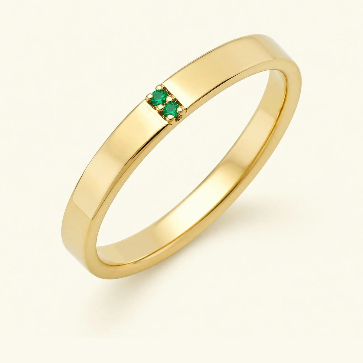 Emerald wedding ring for men in yellow gold