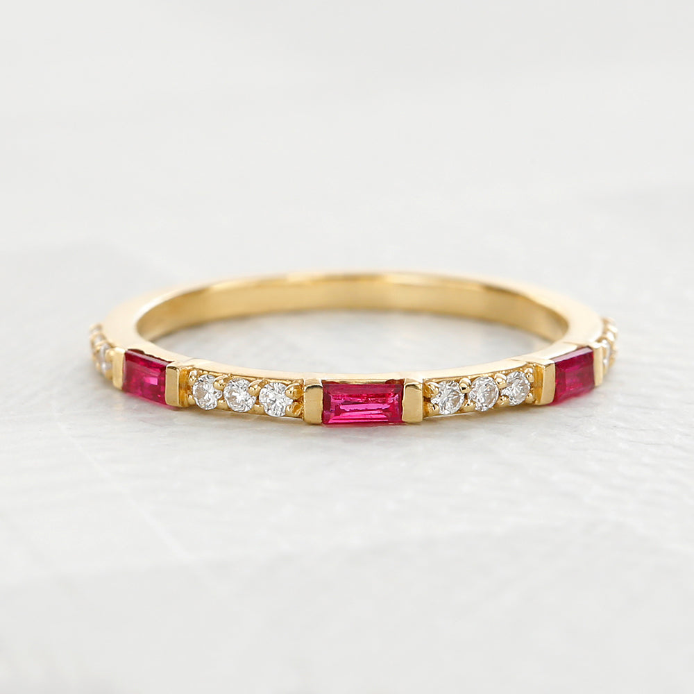 Moksha wedding ring in 18K gold set with baguette cut diamonds by Mayuri