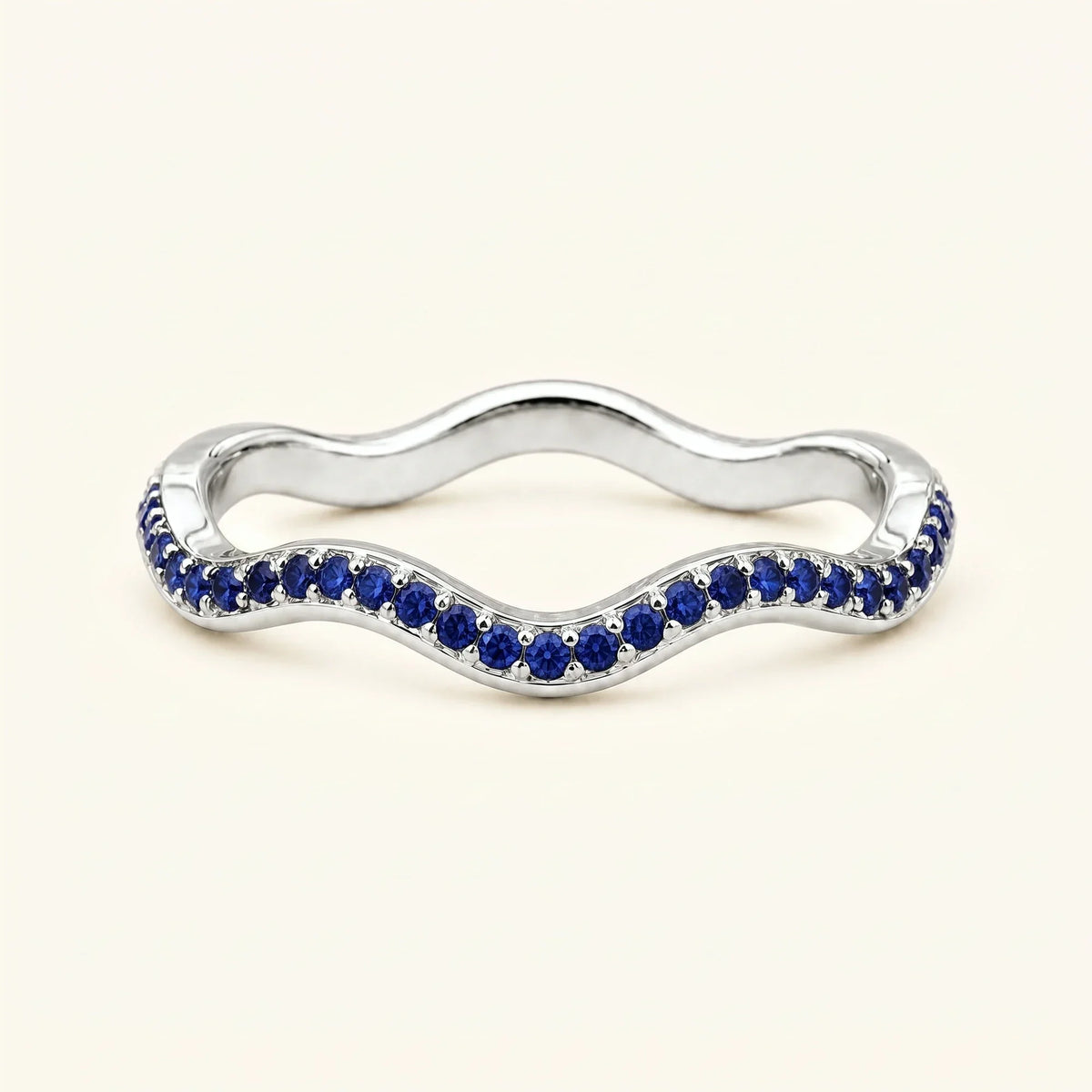 Thalassa wave wedding ring with sapphires in 18K white gold, half-eternity pavé set