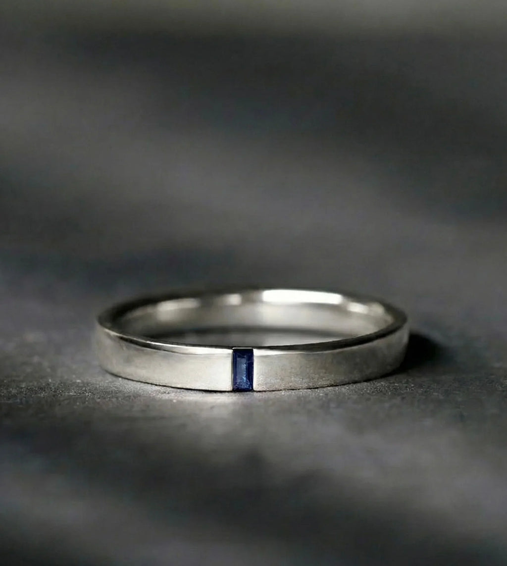 The Agni ring in white gold and sapphire, a refined masculine design for men