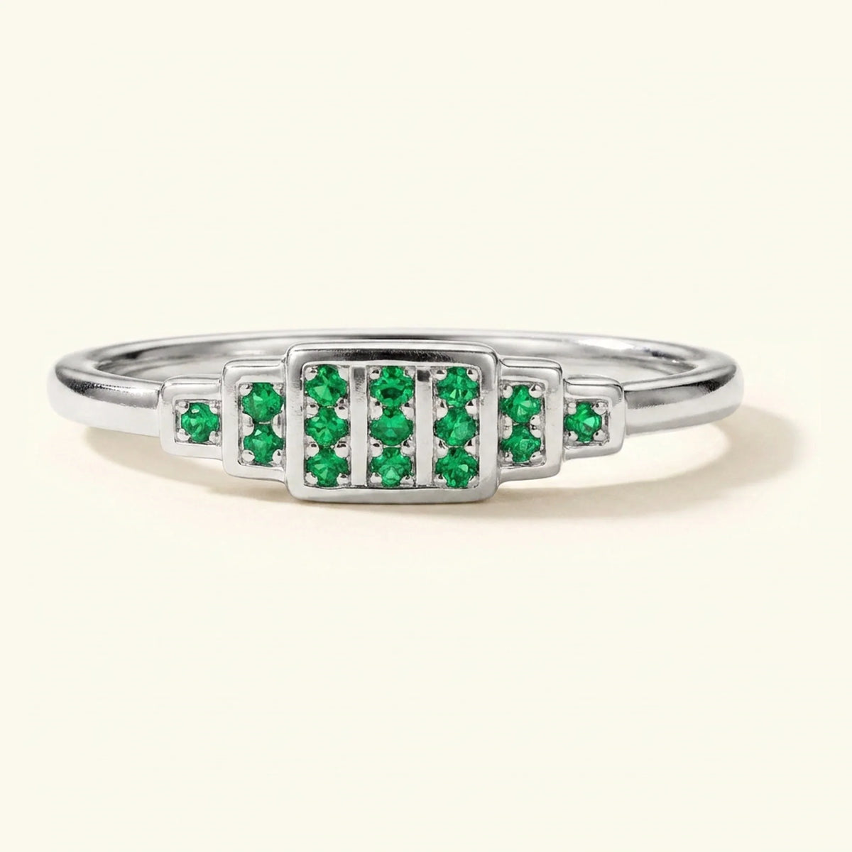 Brami XL geometric art deco wedding ring in white gold set with emeralds