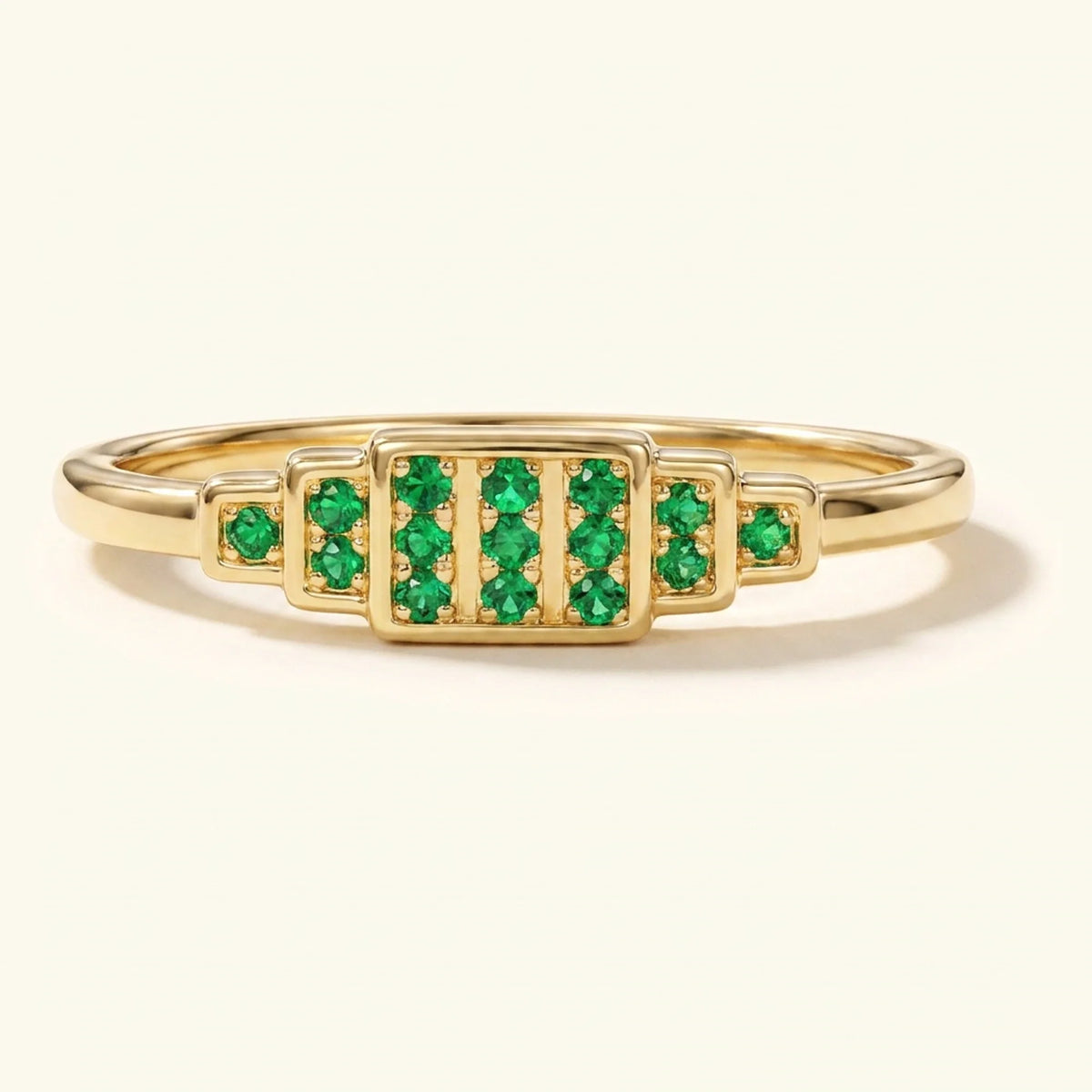 Brami XL geometric art deco wedding ring in yellow gold set with emeralds