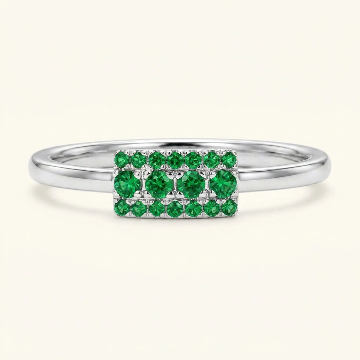 Sapna XL art deco rectangular wedding ring in white gold set with emeralds