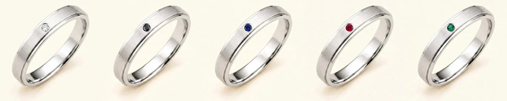 The Dhruva men's ring in 18K white gold, available with diamond, black diamond, sapphire, ruby, and emerald