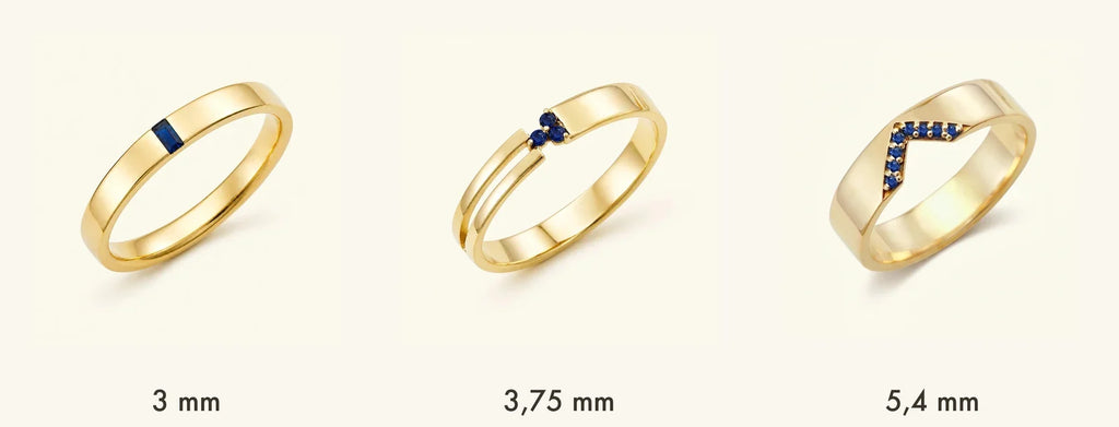 Three widths of Mayuri men's engagement rings in 18K yellow gold: Agni 3 mm, Vibhu 3.75 mm, and Rudra 5.4 mm