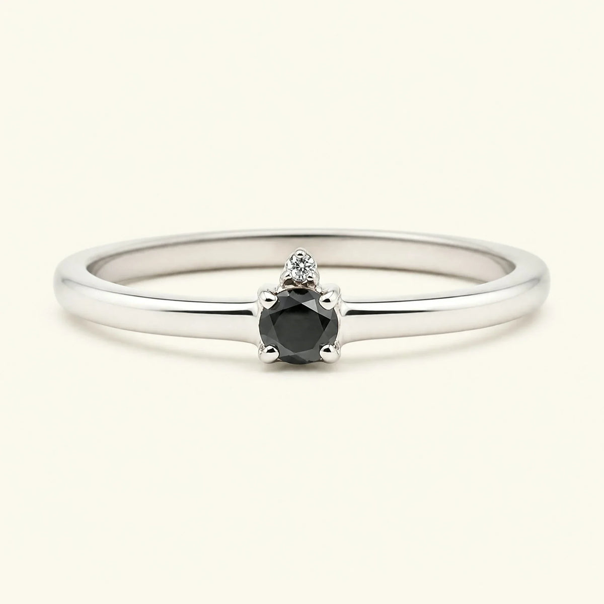 Black diamond solitaire engagement ring in white gold