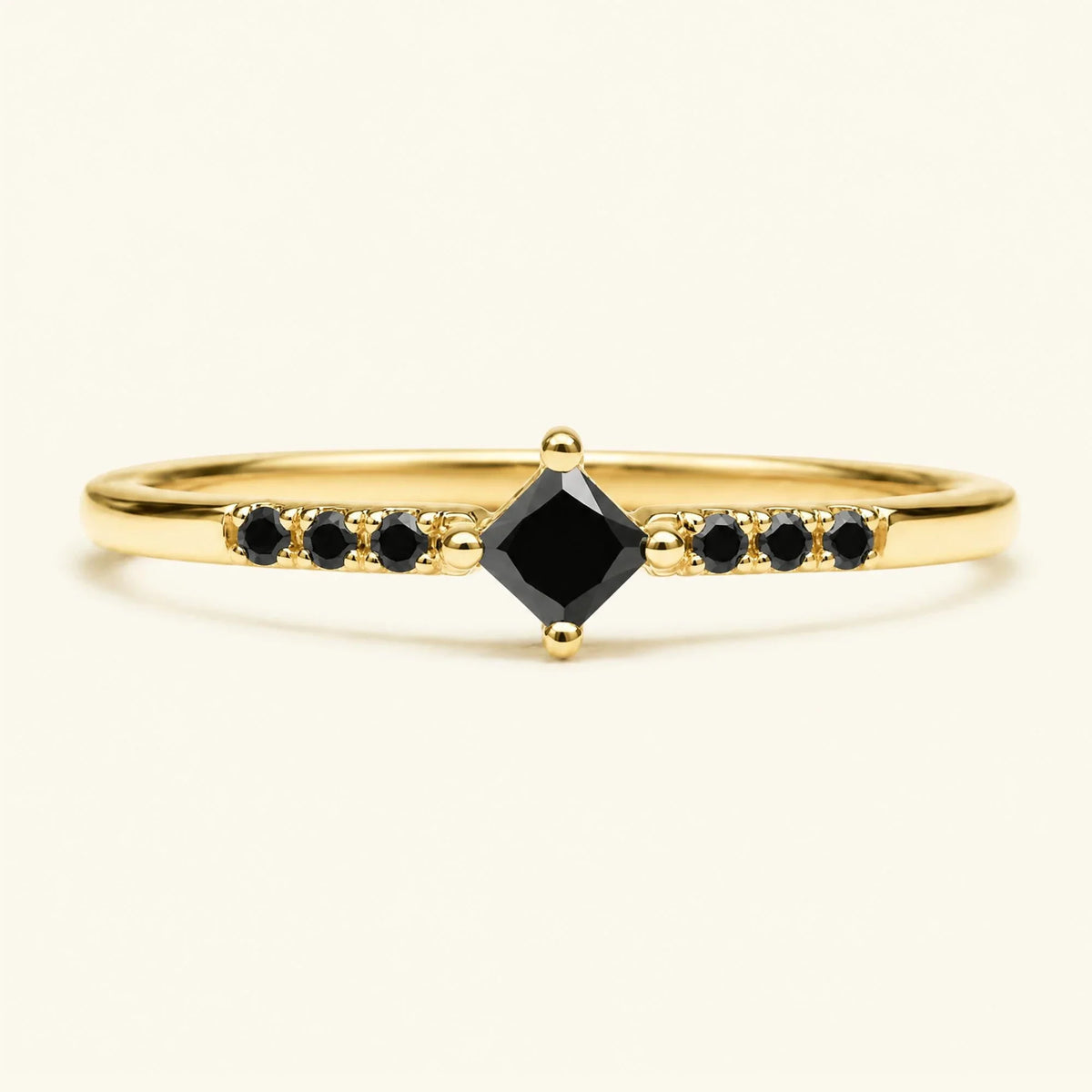 Princess engagement ring pavé set with black diamonds in yellow gold