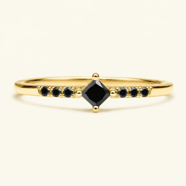 Princess engagement ring pavé set with black diamonds in yellow gold