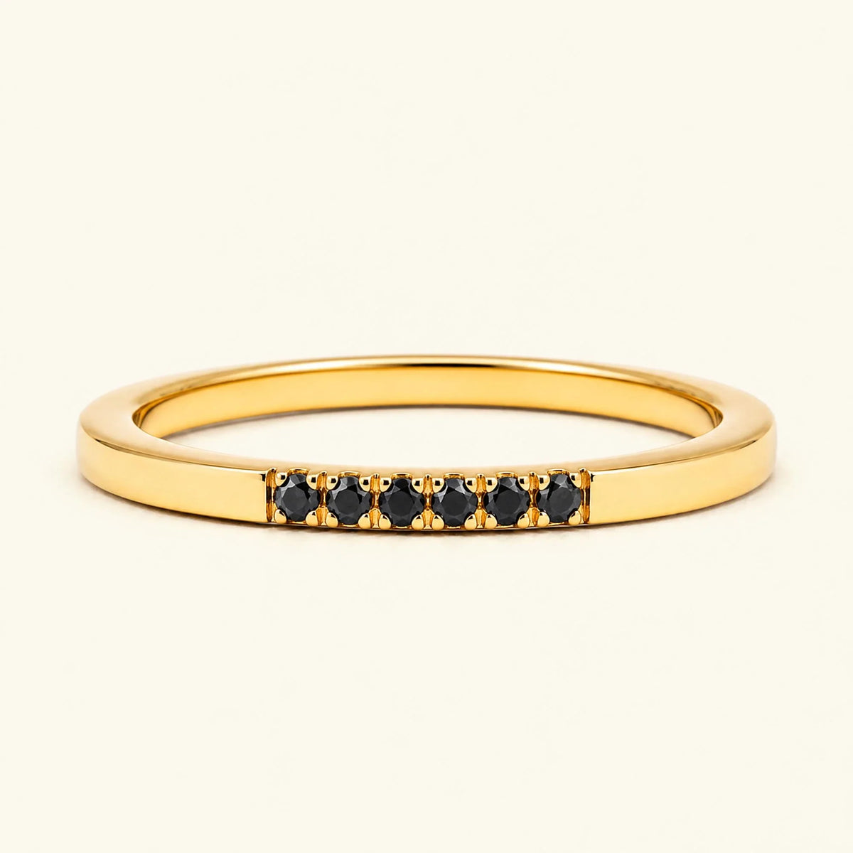 Fine ring pavé set with black diamonds in yellow gold
