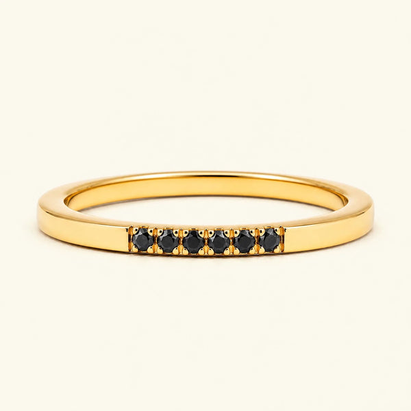 Fine ring pavé set with black diamonds in yellow gold