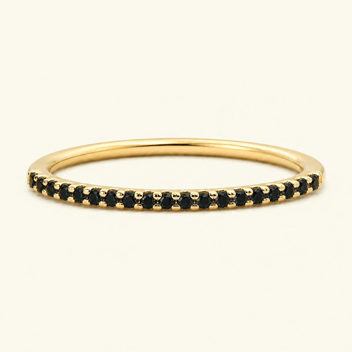 Eternity ring set with black diamonds