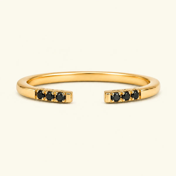 Open fine ring pavé set with black diamonds in yellow gold