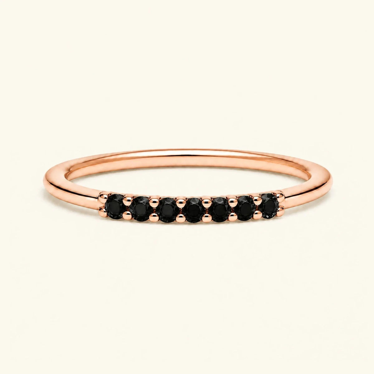 Rose gold Vadha wedding ring pavé set with 7 black diamonds