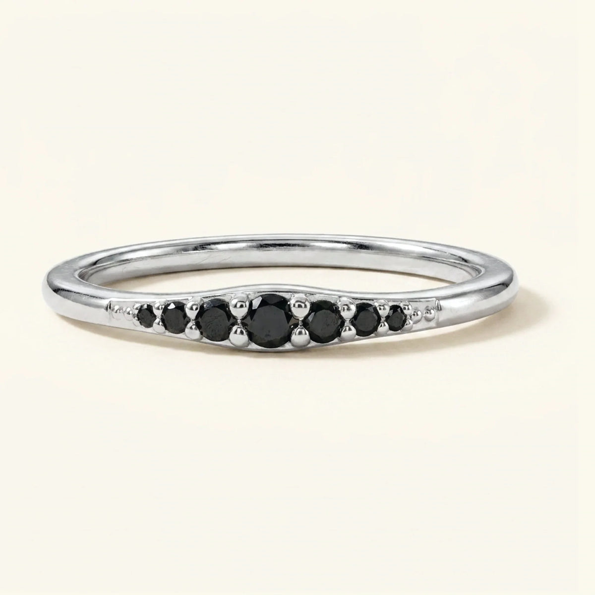 White gold Sushma ring set with 7 black diamonds