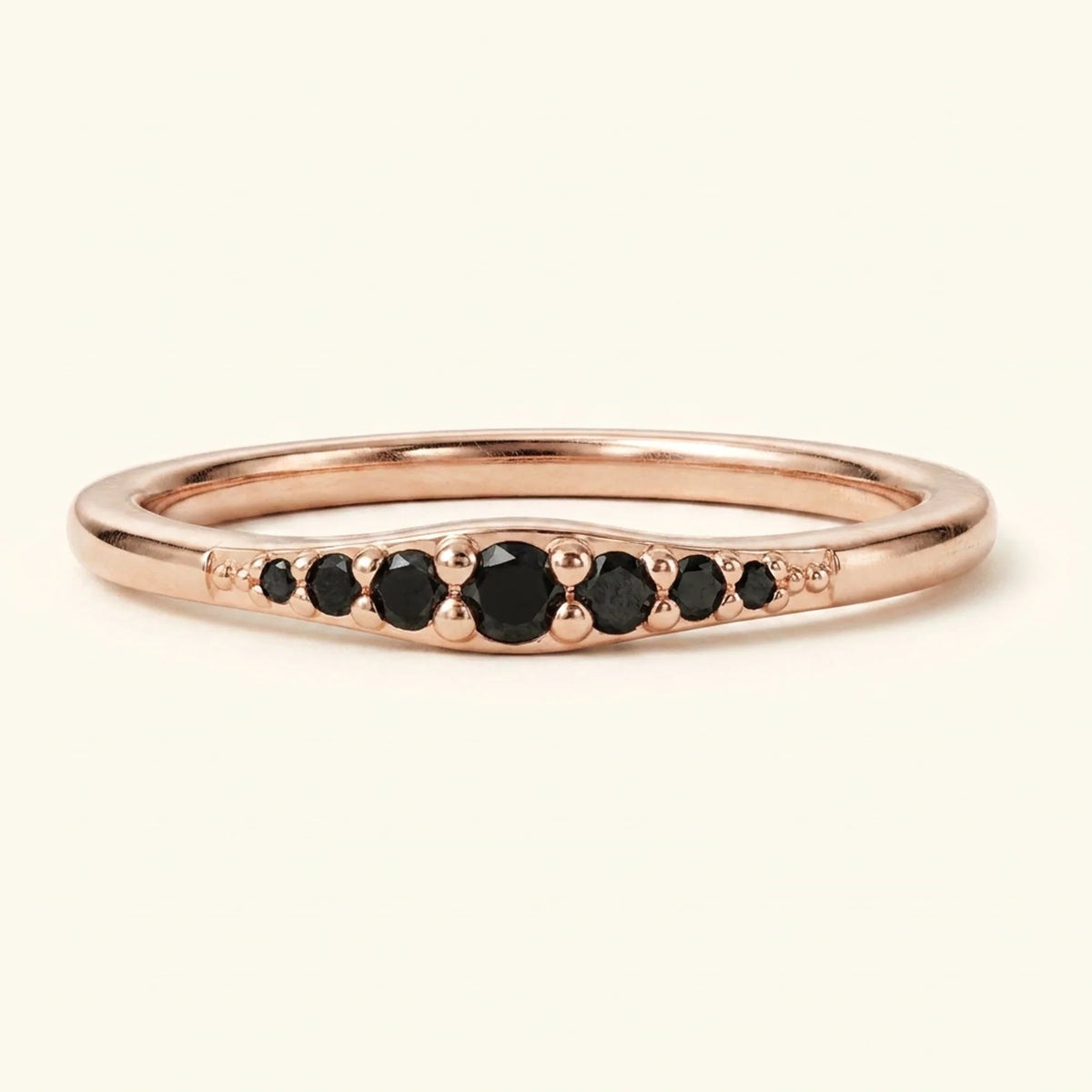 Rose gold Sushma ring set with 7 black diamonds