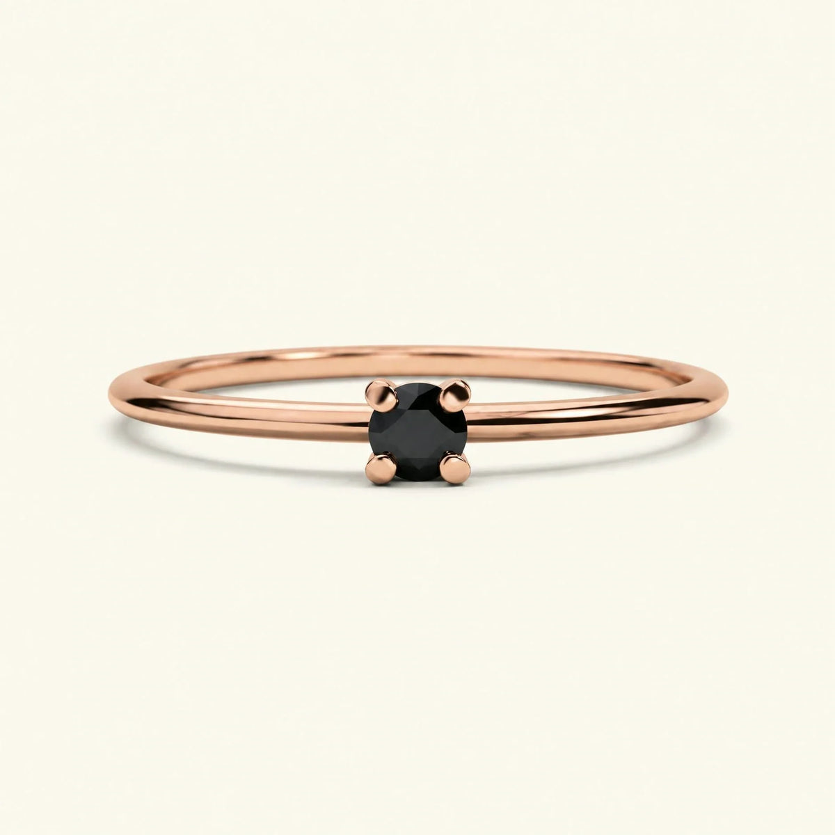 Rose gold 18K solitaire black diamond ring