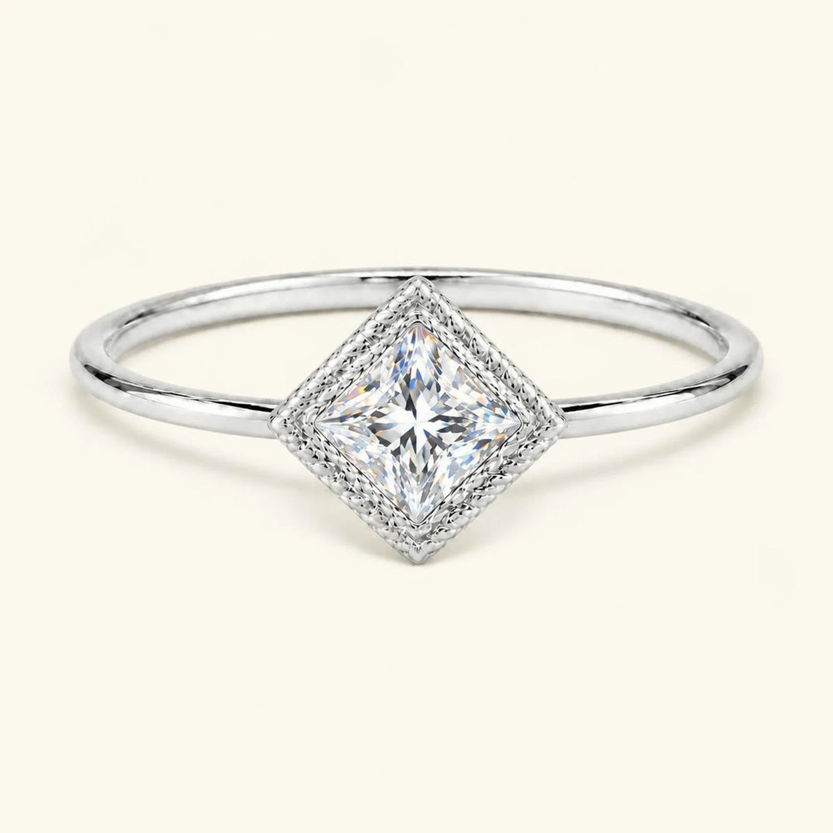 Vintage Indrani engagement ring — diamond solitaire princess cut 4 mm, square stone in twisted rope setting, 18K white gold