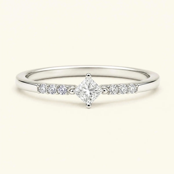 Princess pavé white diamond engagement ring in white gold