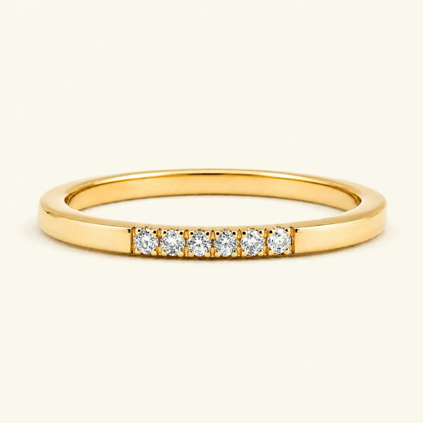 Fine ring pavé set with white diamonds in yellow gold
