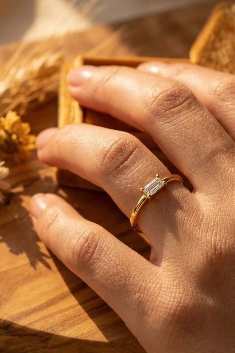Mayuri diamond ring in 18K yellow gold worn on the skin, natural light