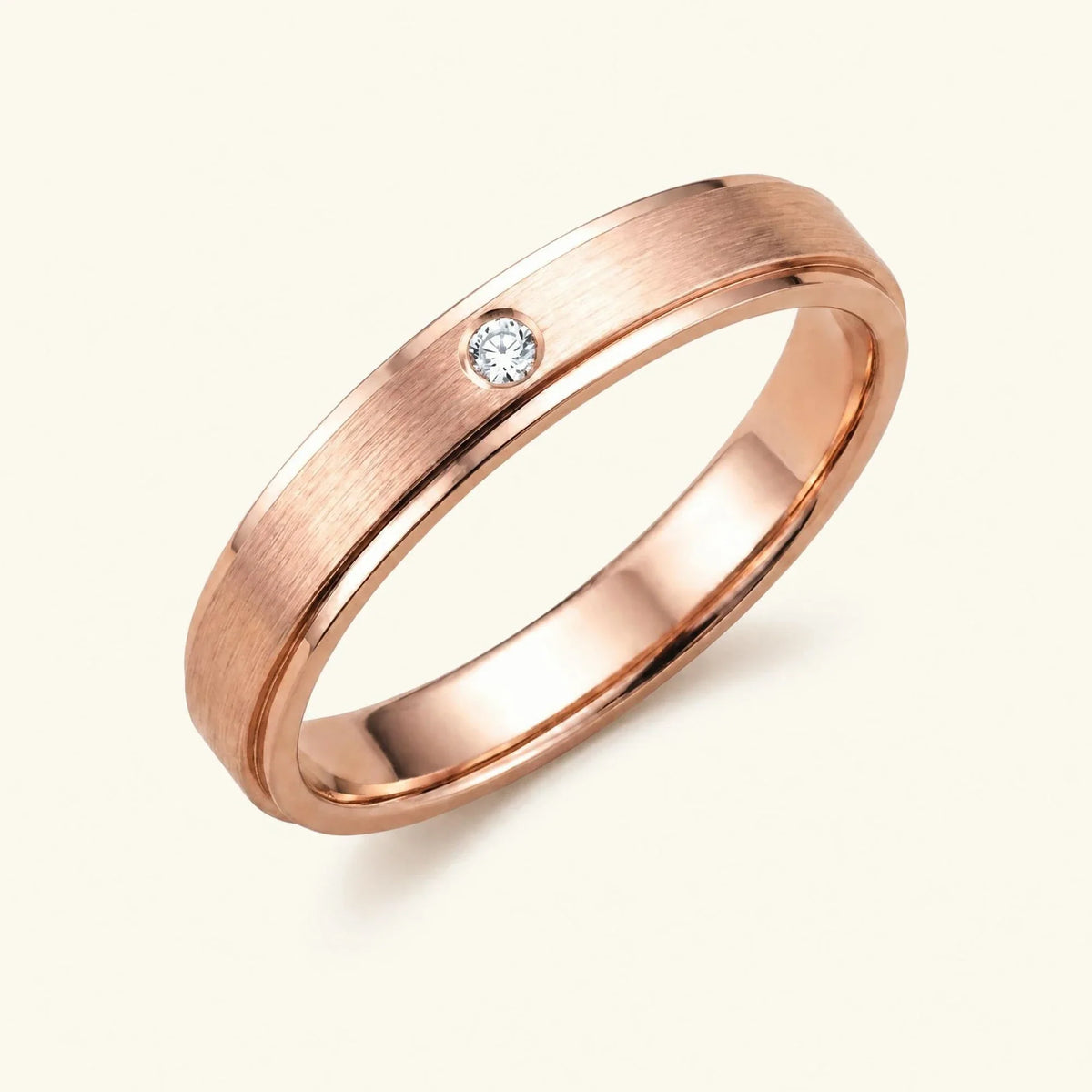 Dhruva diamond wedding band in 18k rose gold, brushed band bezel setting