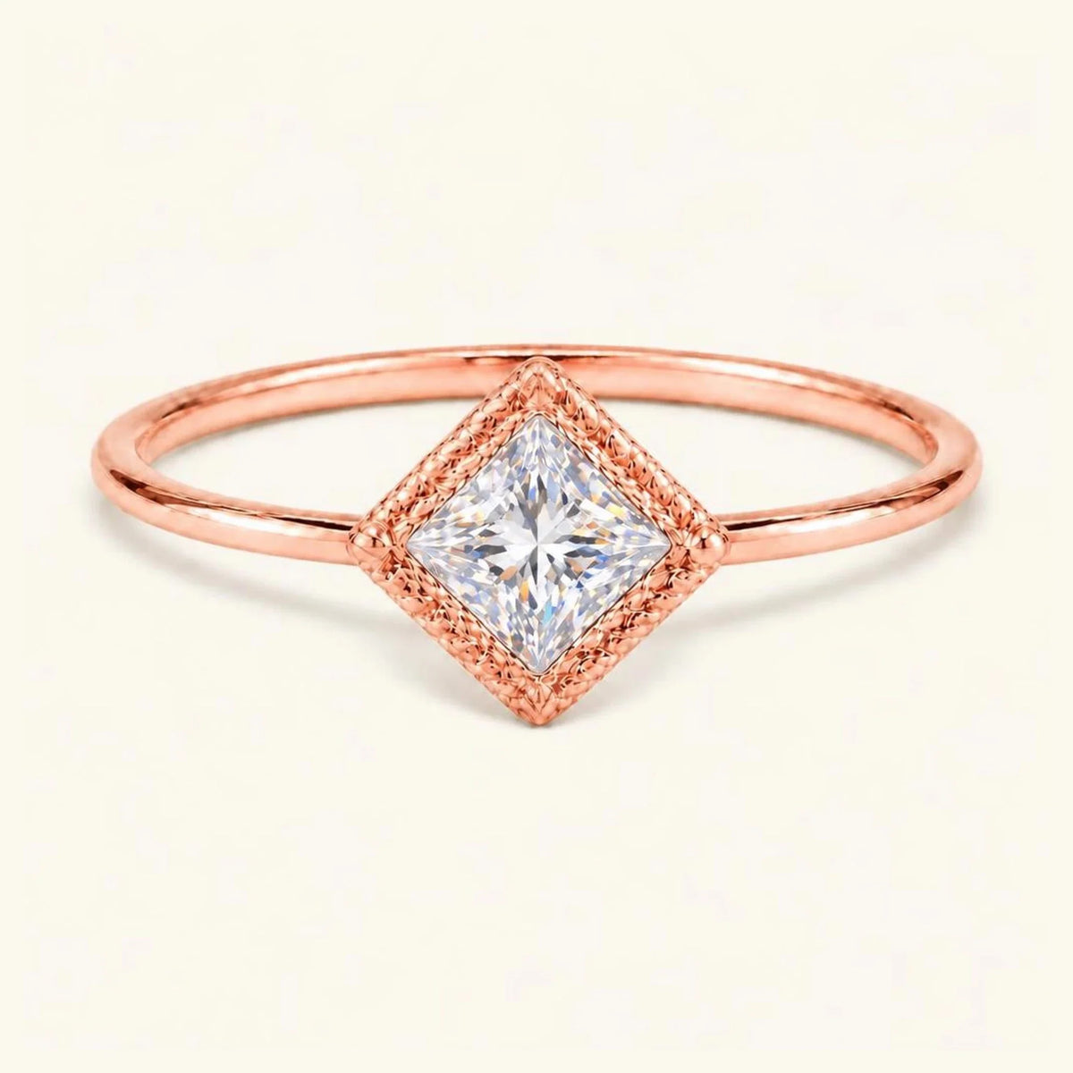 Vintage Indrani engagement ring — diamond solitaire princess cut 4 mm, square stone in twisted rope setting, 18K rose gold