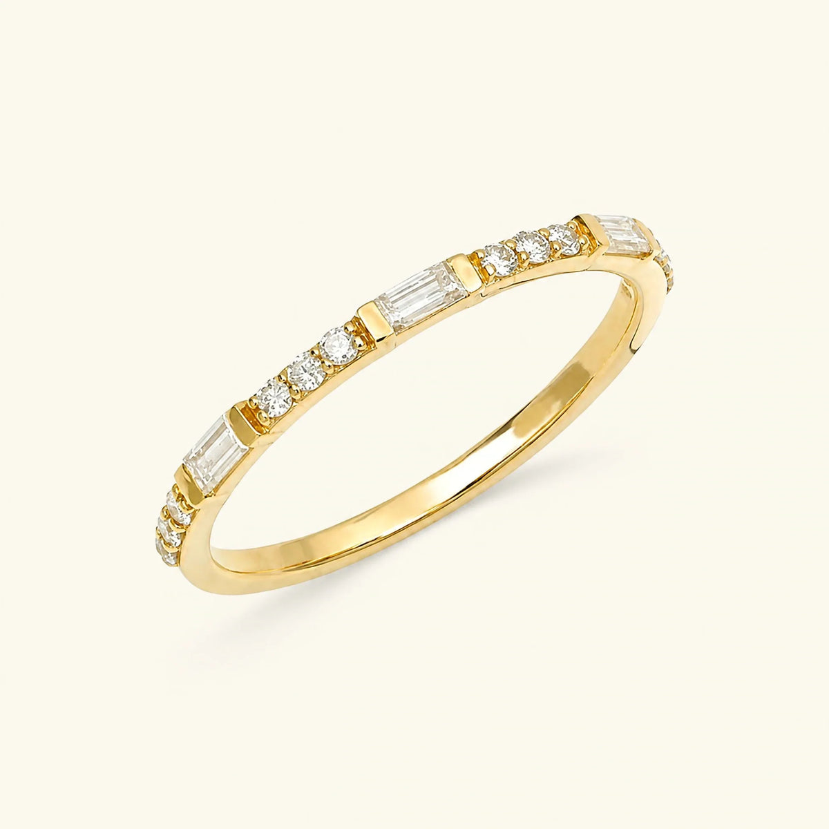 Semi eternity baguette and round diamond ring in yellow gold