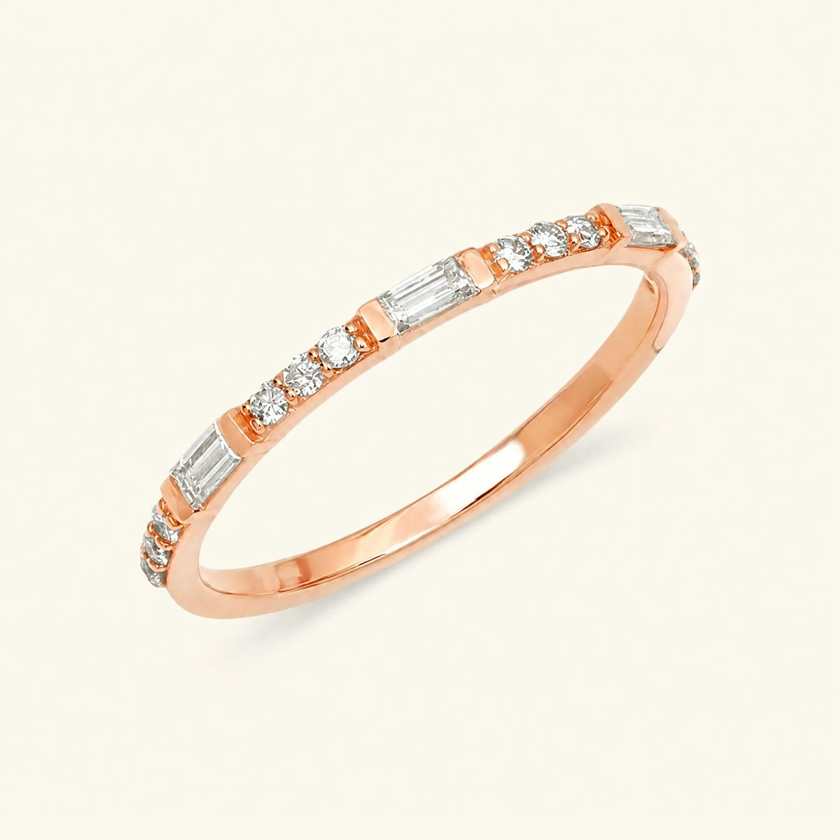 Semi eternity baguette and round diamond ring in 18K rose gold