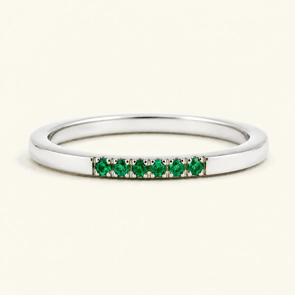 Fine ring pavé set with emeralds in white gold