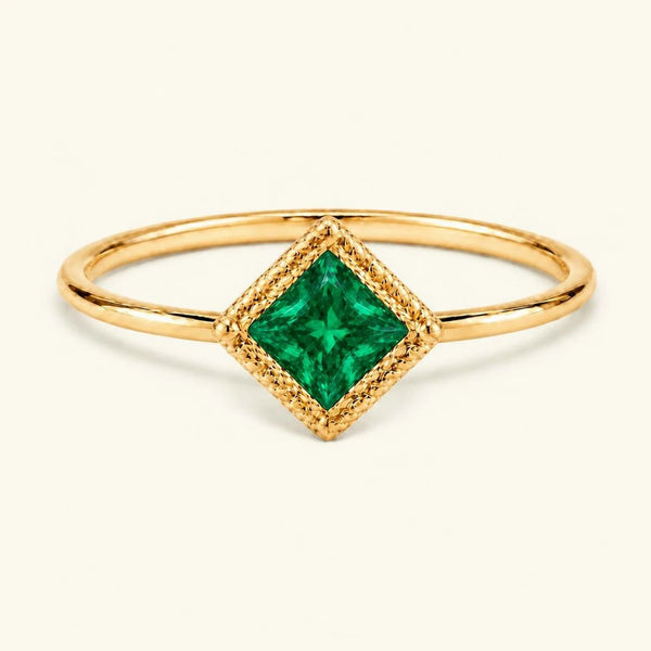 Vintage Indrani engagement ring — emerald solitaire princess cut 4 mm, square stone in twisted rope setting, 18K yellow gold