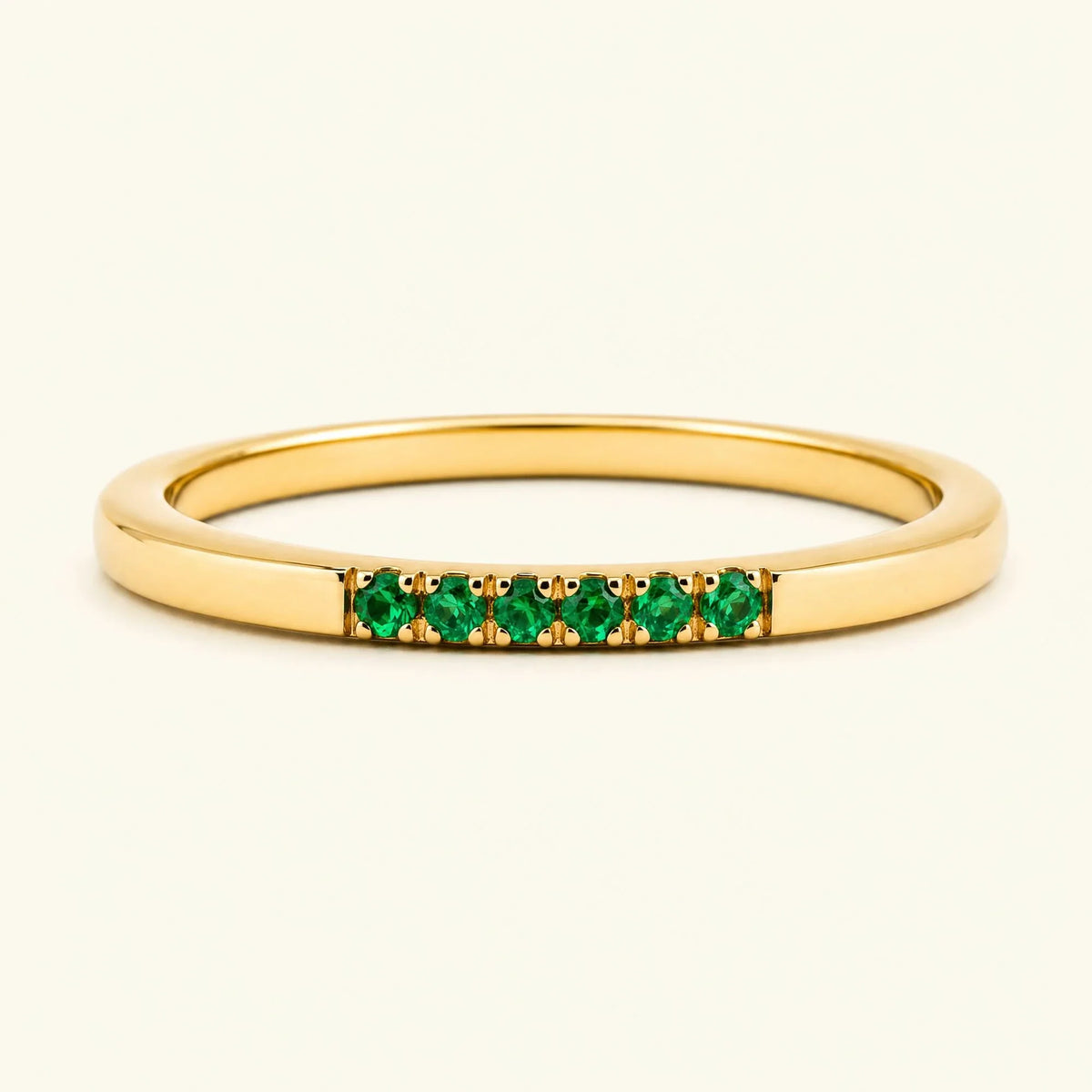 Fine ring pavé set with emeralds in yellow gold