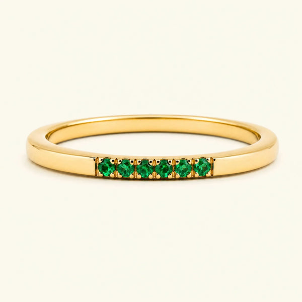 Fine ring pavé set with emeralds in yellow gold