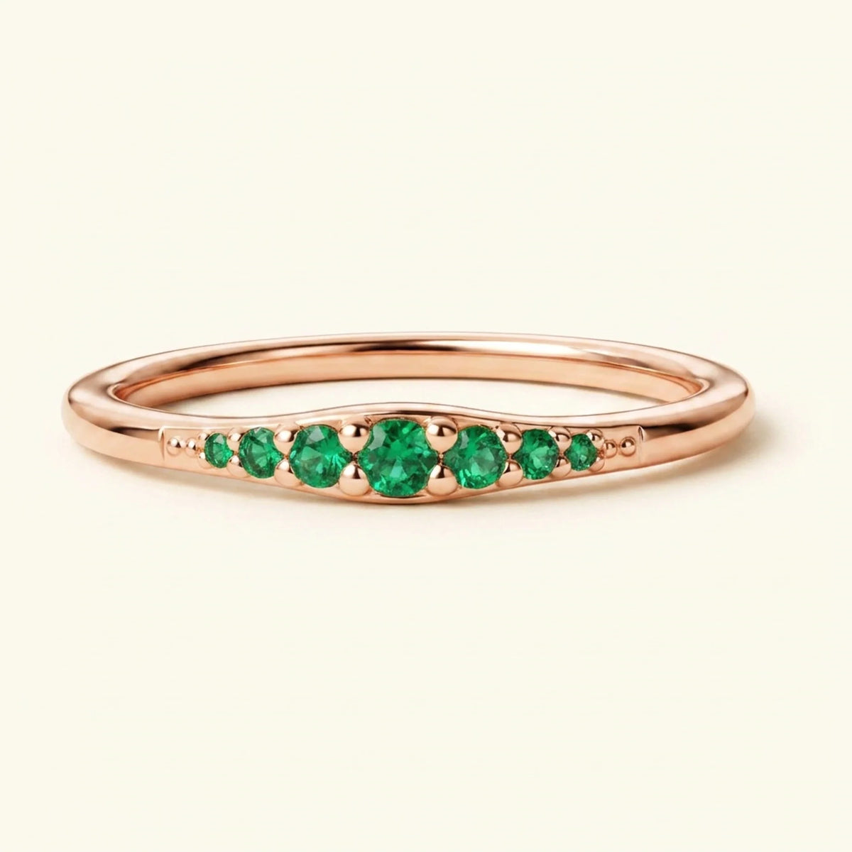 Sushma emerald wedding ring in rose gold