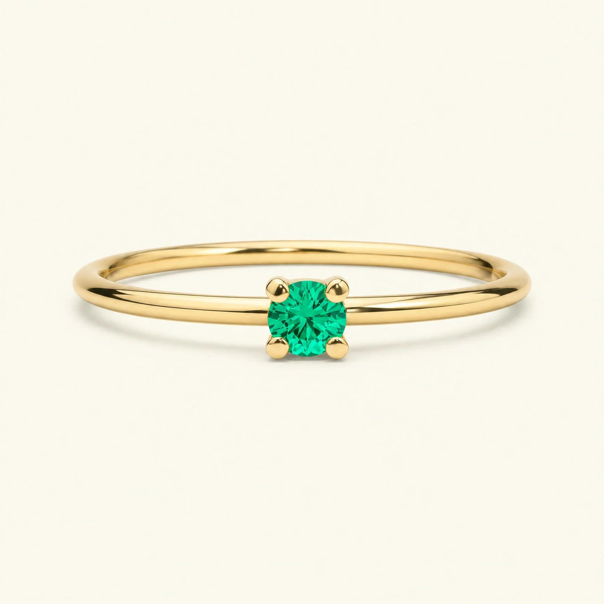 Saral ring in yellow gold set with an emerald