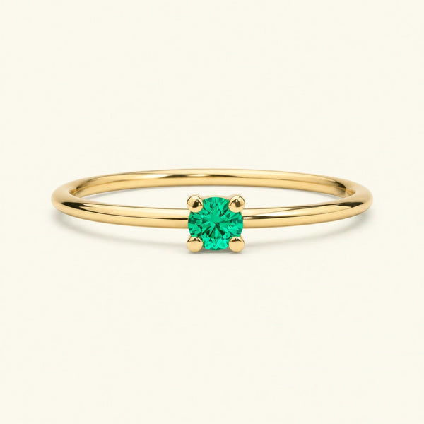 Saral ring in yellow gold set with an emerald