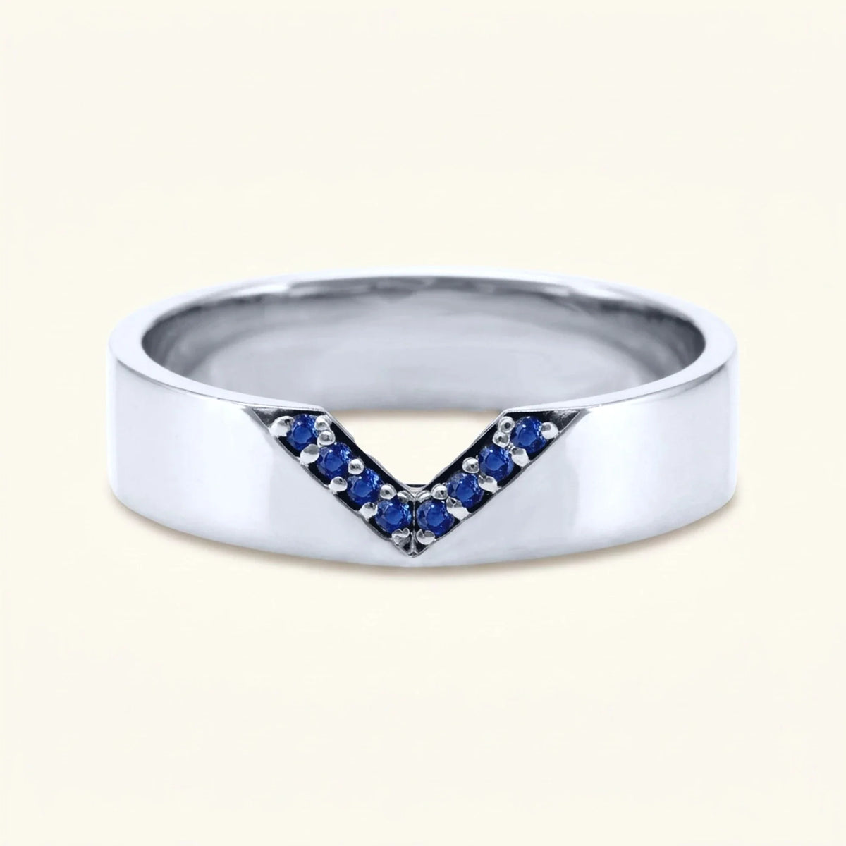 V-shaped ring pavé set with sapphires for men in white gold
