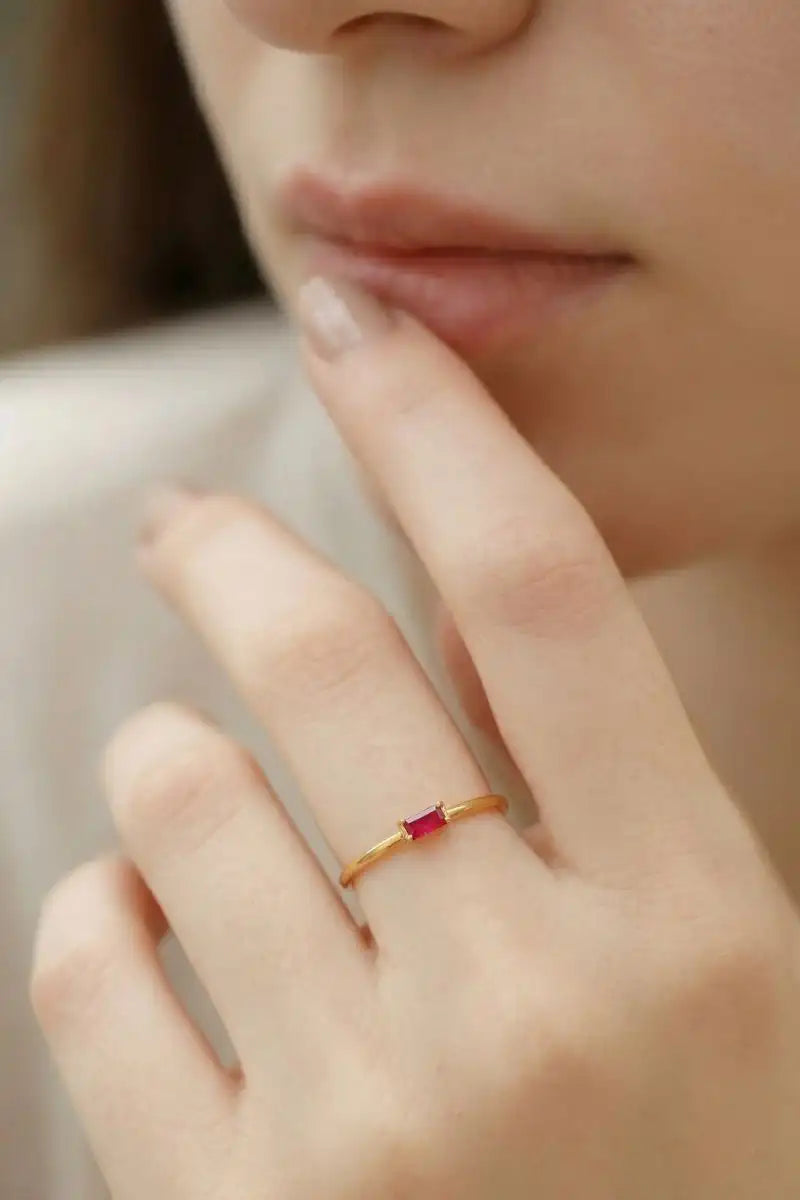 Mayuri 18K yellow gold ruby engagement ring, worn on the hand