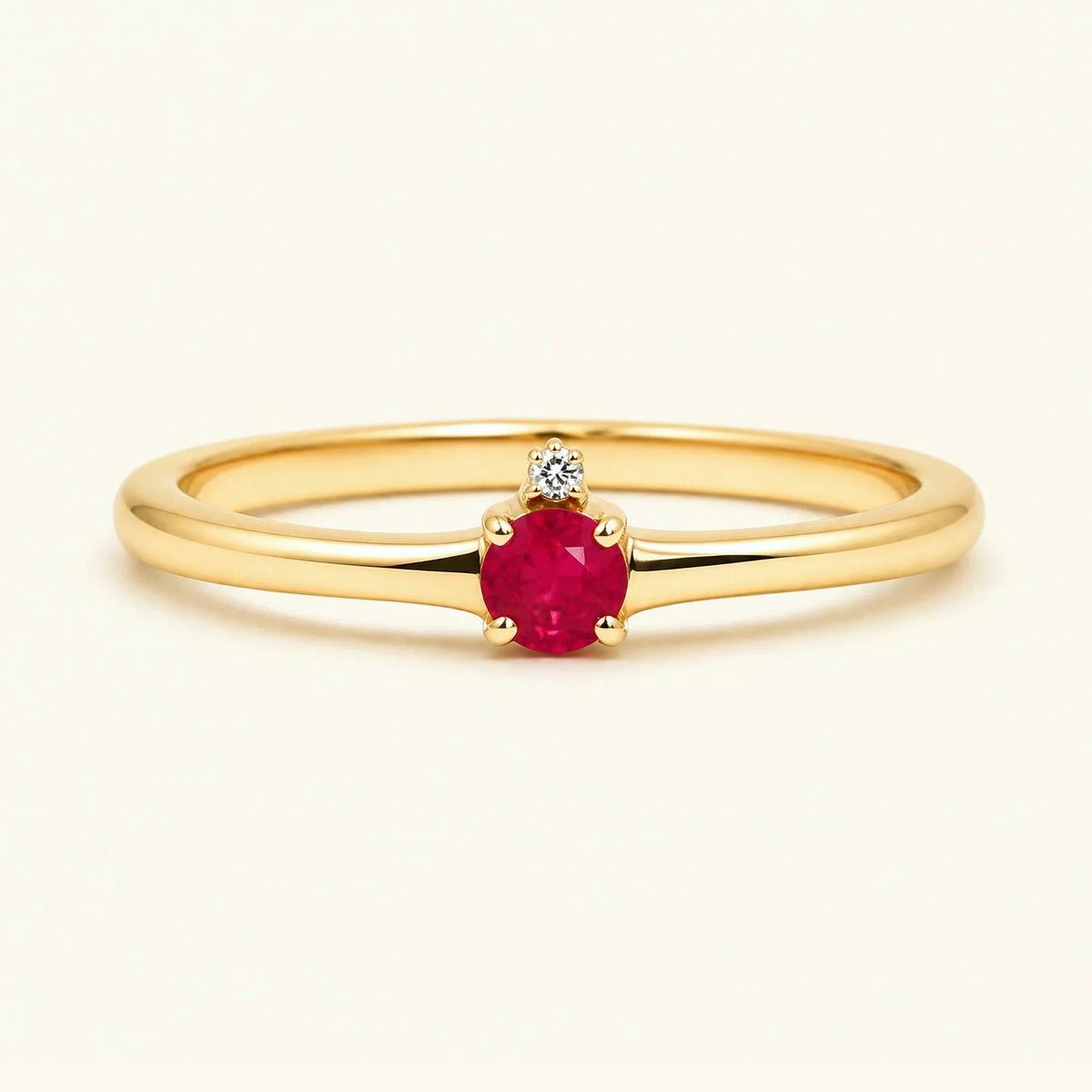 Ruby solitaire engagement ring in yellow gold