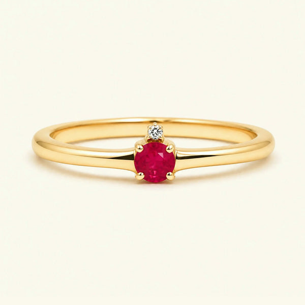 Ruby solitaire engagement ring in yellow gold