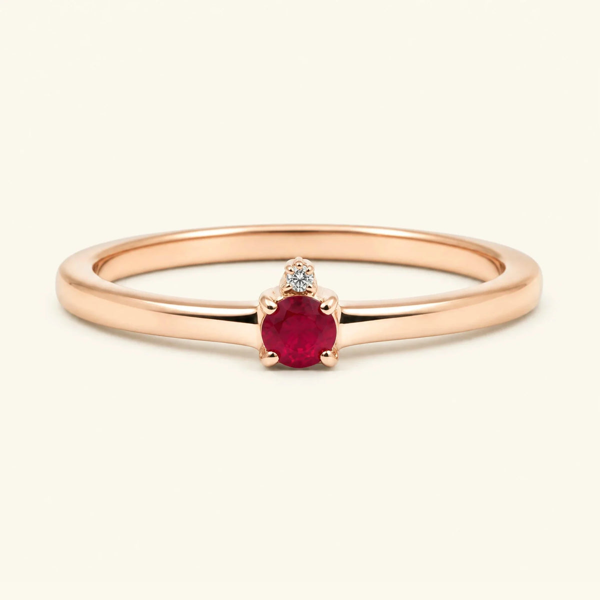 Ruby solitaire engagement ring in rose gold