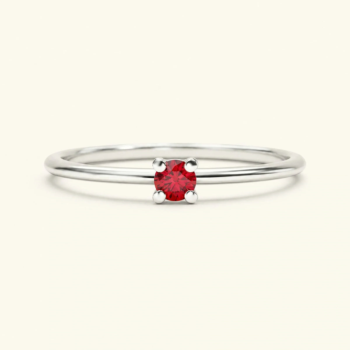 Ruby solitaire ring in 18K white gold