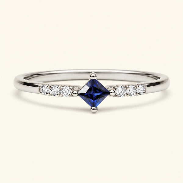 Princess engagement ring sapphire and diamonds in white gold
