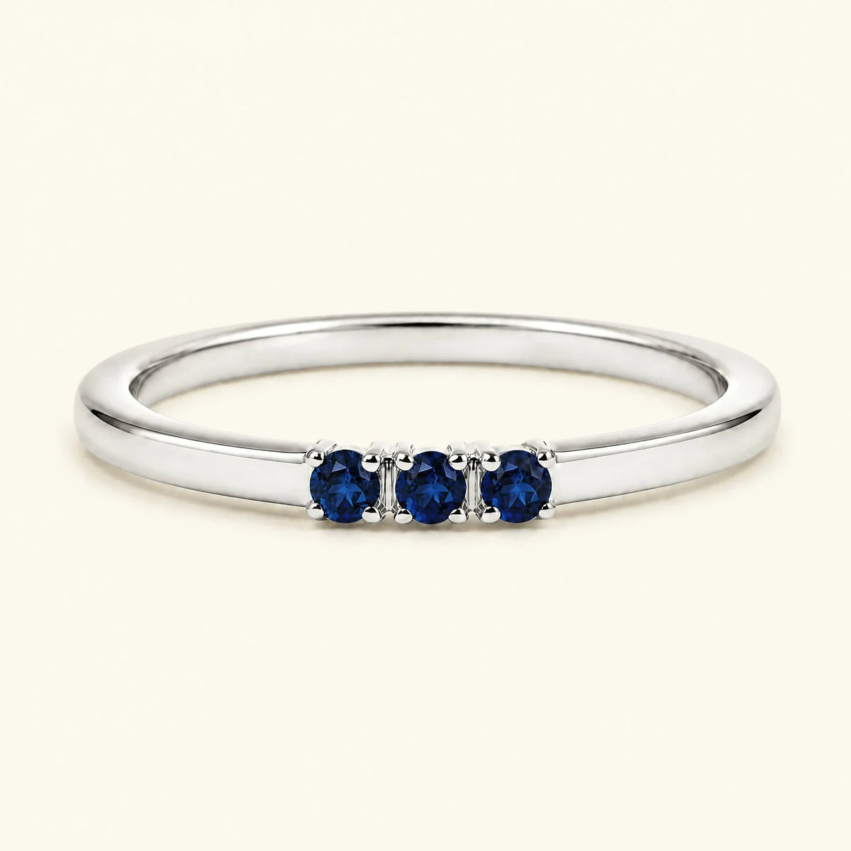 Sapphire trilogy engagement ring in white gold
