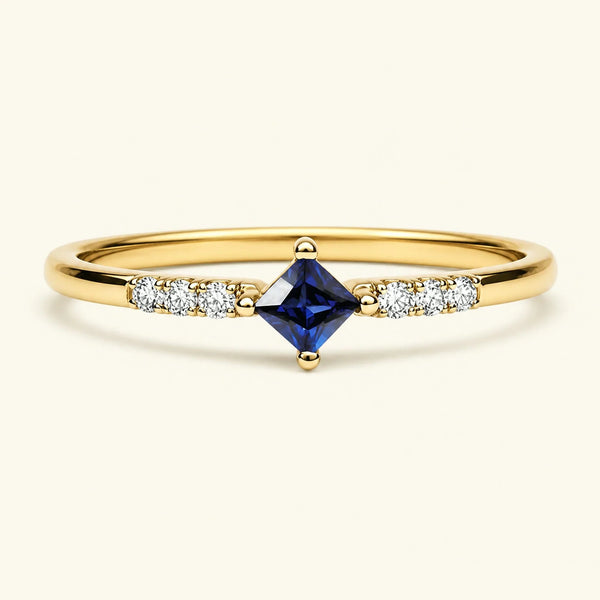 Princess sapphire diamond engagement ring in yellow gold