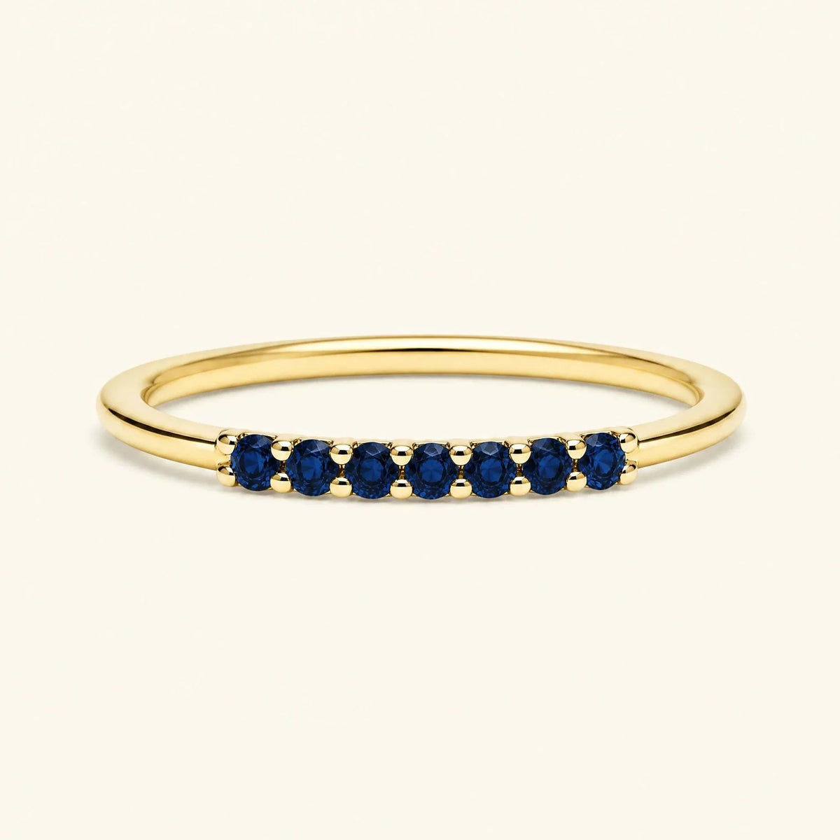Yellow gold Vadha wedding ring pavé set with 7 sapphires