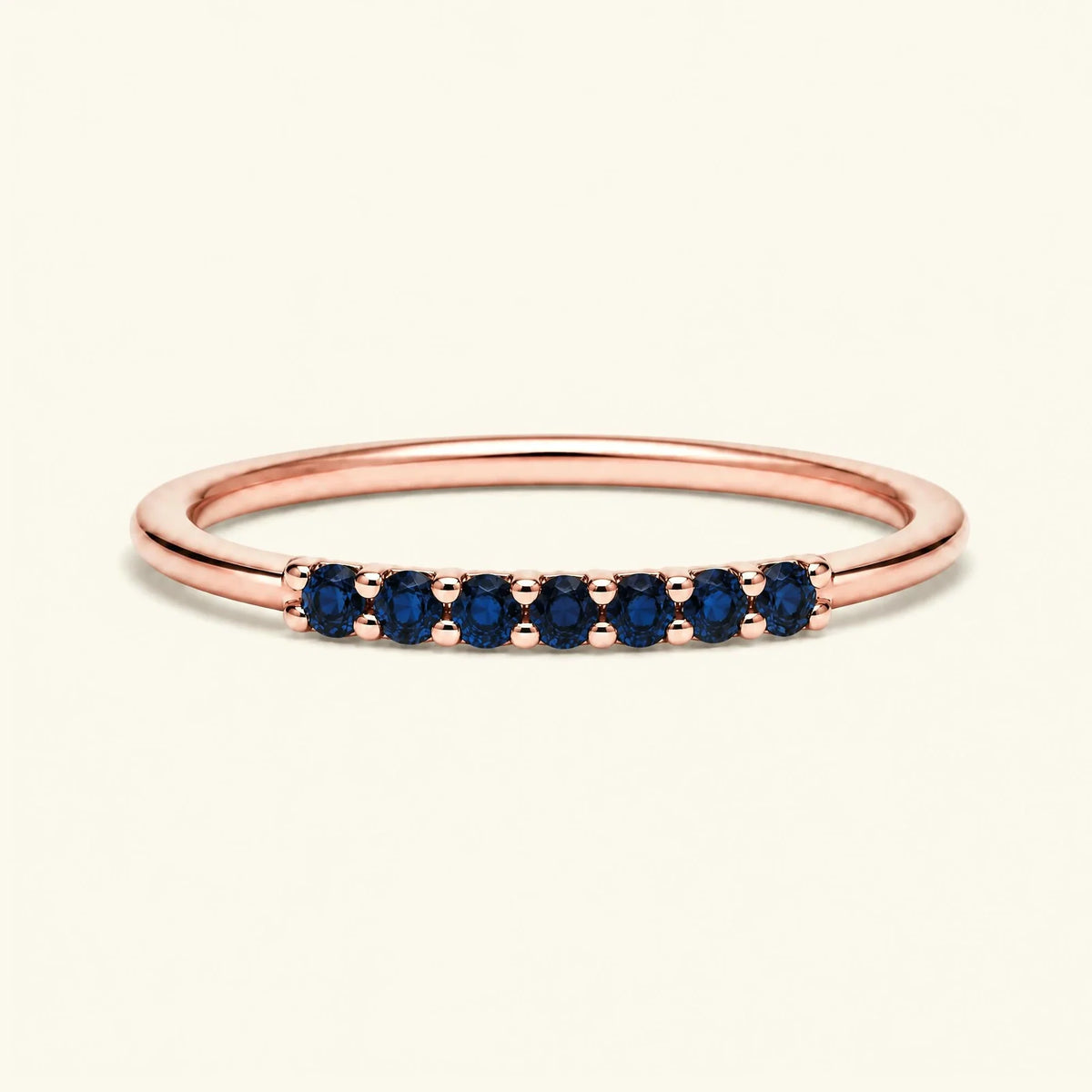 Rose gold Vadha wedding ring pavé set with 7 sapphires