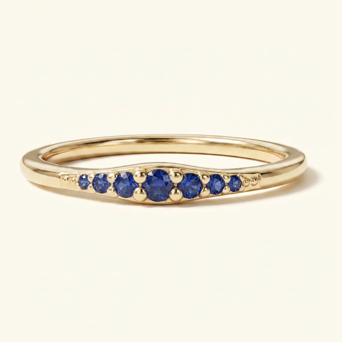 Yellow gold Sushma ring set with sapphires